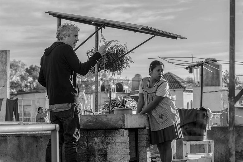 Alfonso Cuarón directs Yalitza Aparicio as Cleo on the set of Roma.